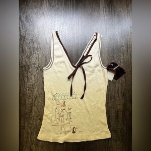 Stylish Cream Tank Top with Brown Accents